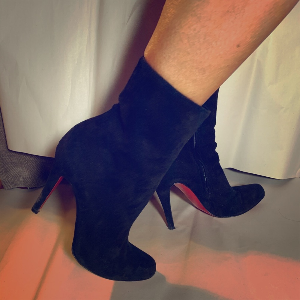Timeless black leather Louboutin booties